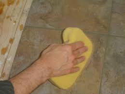 Applying grout to ceramic tile