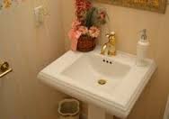Consider a Pedestal Sink in your remodeled powder room.