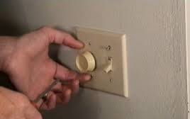 Installing a dimmer switch.